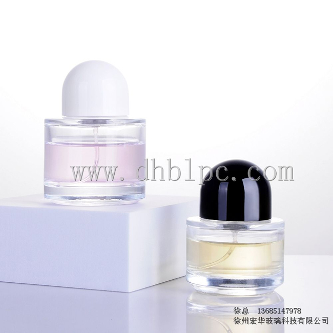 cylindrical perfume bottle